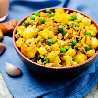 Blumenkohl mit indischem Gemüsereis